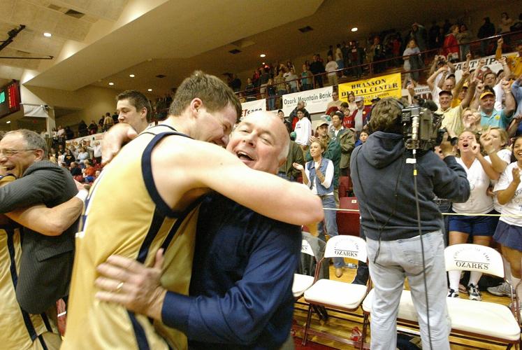 Danny Miles gets hug after 2004 title game